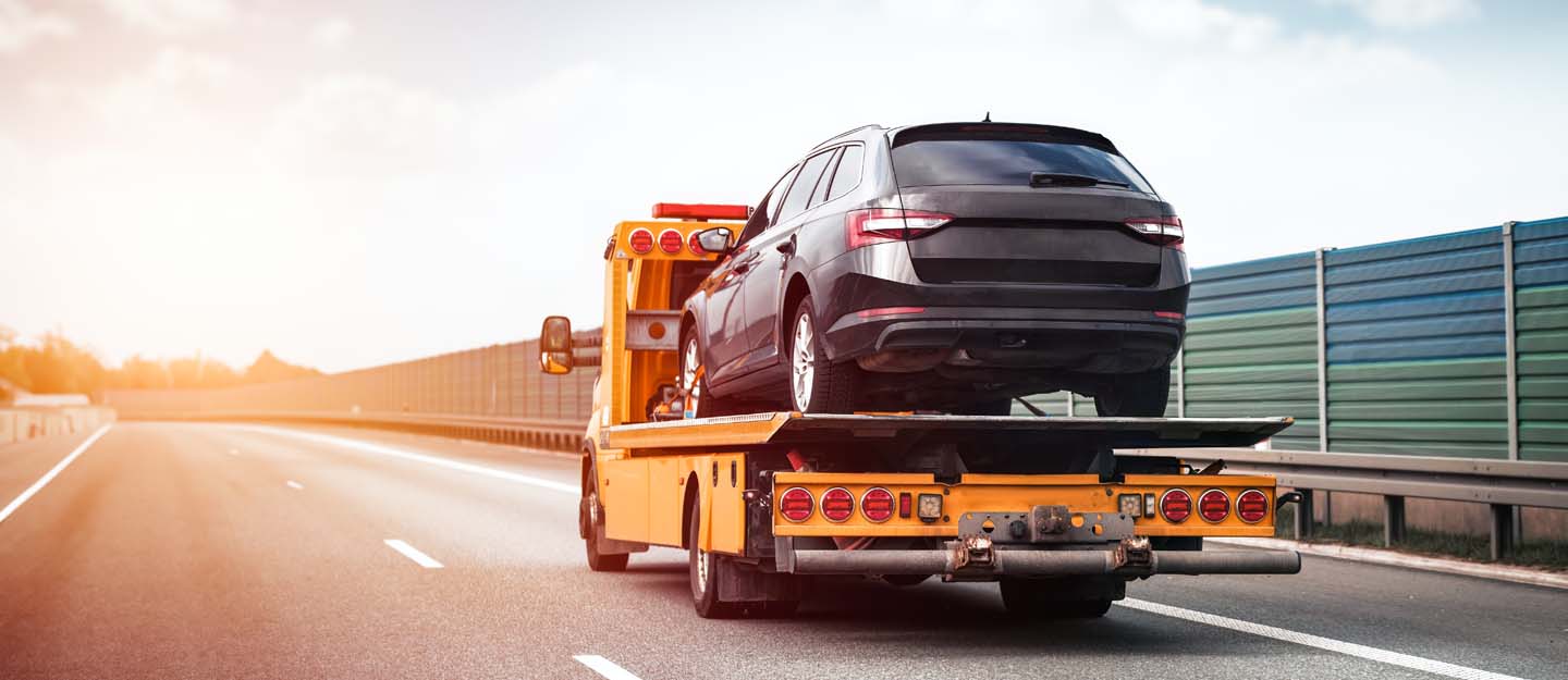 Flatbed towing for luxury and standard vehicles