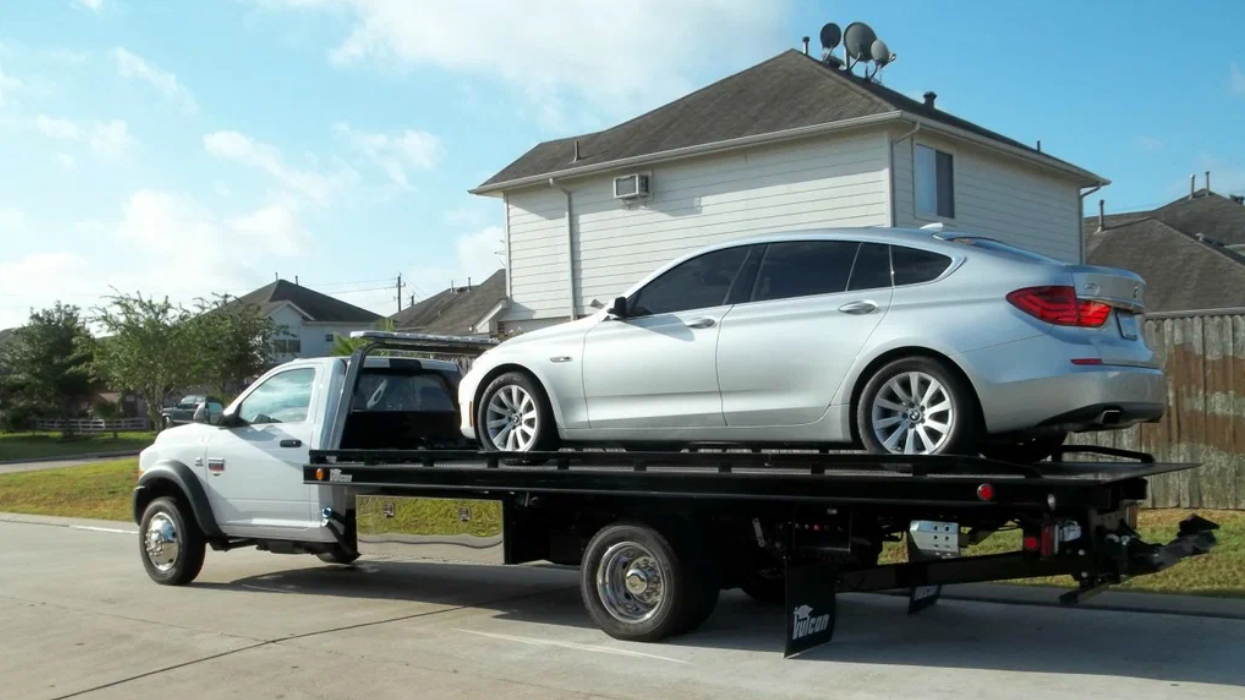 Luxury car on flatbed for safe transport